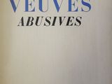 the front cover of a book with blue writing on it