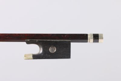 a close up of a violin bow on a white background