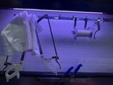 a hospital room with a hospital bed and a neon light
