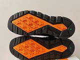 a close up of a pair of shoes on top of a box