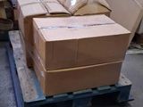 many boxes on a pallet in a warehouse