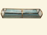 a glass display case with a metal handle on it