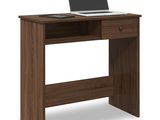 a computer desk with a laptop on top of it
