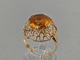 an image of a gold ring with a citrine stone in it