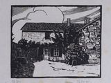 a black and white drawing of a house in the country
