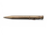a gold pen with a black tip on a white background