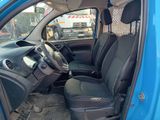 a picture of a blue car with black leather seats