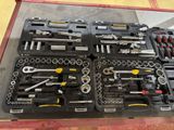 a lot of tools in the case on the table