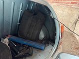 an image of a trash can with a lot of items in it