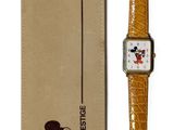 mickey mouse watch with box and watch strap on white background