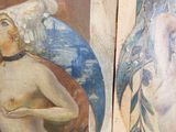 a painting of a nude woman on the wall