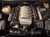 the engine of a car with the hood up and the hood down