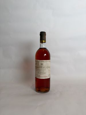 a bottle of liquor sitting on a table