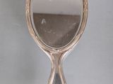 a mirror that is sitting on top of a table