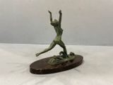 art deco bronze sculpture of a woman leaping on a wave