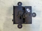 an image of a close up of a metal latch on a table