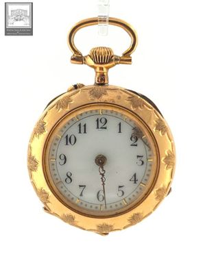 a gold pocket watch with a white face on a white background