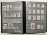 a lot of stamps on the pages of a book