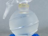 a plastic object with a blue base and a plastic bird on top