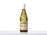 a bottle of white wine sitting on top of a table