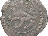 a silver coin with an image of a man on it