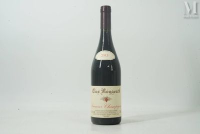 a bottle of wine that is sitting on a table