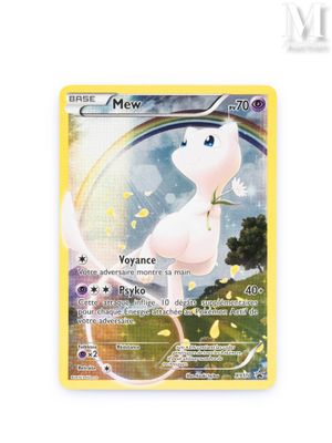 a close up of a pokemon card on a white surface