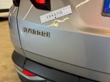 a close up of a car with a sticker on the back of it