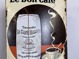 a sign that says le bon cafe with a picture of a bag of coffee