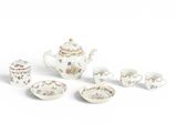 une image représentant un ensemble de théières et de tasses en porcelaine