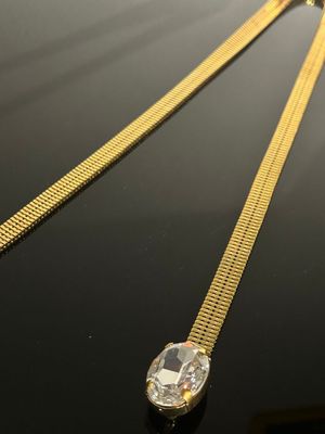 Yves SAINT-LAURENT. CEINTURE à mailles souples, le fermoir r…