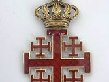 an image of a cross with a crown on top of it