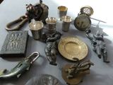 a table with a lot of antique items on it