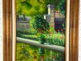 tableau à l'huile encadré représentant une scène de jardin avec des fleurs et un portail