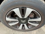 a close up of a tire on a vehicle