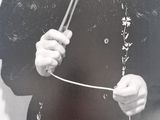 black and white photograph of a woman with a hammer in her hand