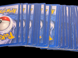 a lot of pokemon cards on a black background