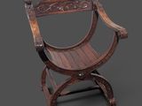 une vieille chaise en bois dont l'assise est sculptée, sur fond gris