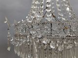 a chandelier hanging from the ceiling in a room