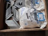 a box full of assorted items sitting on the floor