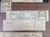 several different types of paper money are on display on a table