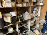 a lot of boxes and other items on the shelves