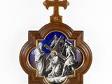 a wooden cross with a picture of jesus and other people on it
