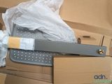 a large knife that is in a box with a plastic handle