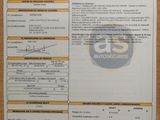 an image of a document with a picture of a car on it