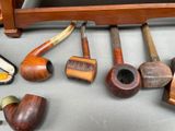 a lot of different types of pipes on the table