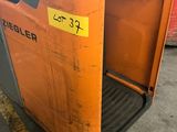 an image of a forklift with the door open in a warehouse