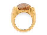 a close up of a gold ring with a brown stone