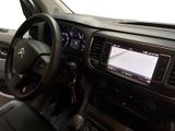 a dashboard of a car with a steering wheel and a dash board