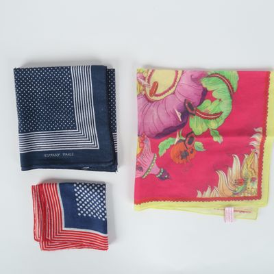 several different types of handkerchiefs laid out on a white surface